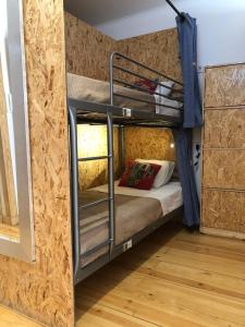 a room with two bunk beds in a room at NOW Bastidor Jovial in Lisbon