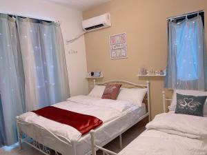星動小屋民宿客房内的一张或多张床位