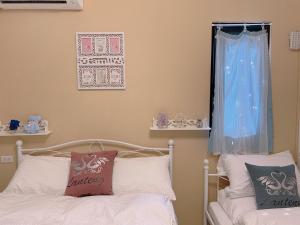 星動小屋民宿客房内的一张或多张床位