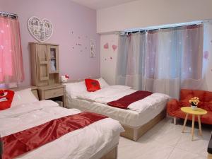 星動小屋民宿客房内的一张或多张床位