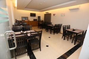A restaurant or other place to eat at Yangon Win Hotel