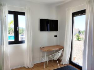 Μια τηλεόραση ή/και κέντρο ψυχαγωγίας στο Lazy 8 Villa