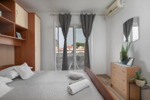 Foto dalla galleria di Sea view apartments M a Podgora