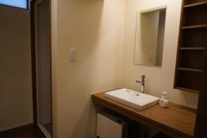 Ein Badezimmer in der Unterkunft 吹屋庵