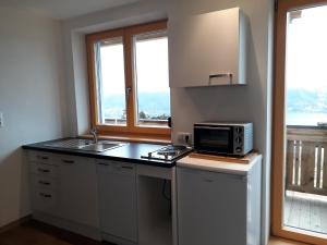 Una cocina o zona de cocina en Alpenhof Grafleiten