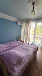 Postel nebo postele na pokoji v ubytování Gios Guest House