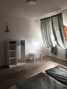 Voodi või voodid majutusasutuse Korall Apartman Fonyód toas