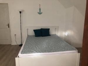 Voodi või voodid majutusasutuse Korall Apartman Fonyód toas