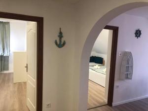 Voodi või voodid majutusasutuse Korall Apartman Fonyód toas