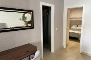 Posteľ alebo postele v izbe v ubytovaní Apartamento en Playa Real, en 1ª línea de playa
