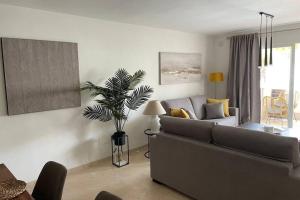 Posedenie v ubytovaní Apartamento en Playa Real, en 1ª línea de playa