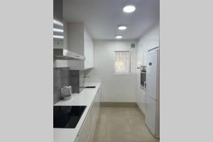 Kuchyňa alebo kuchynka v ubytovaní Apartamento en Playa Real, en 1ª línea de playa