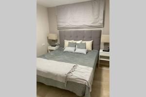 Posteľ alebo postele v izbe v ubytovaní Apartamento en Playa Real, en 1ª línea de playa