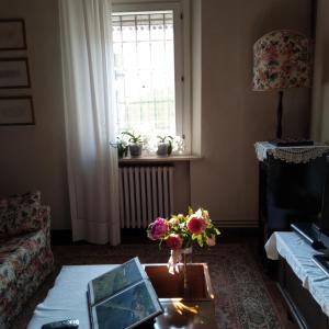 Postel nebo postele na pokoji v ubytování Corte Posta B&B - parcheggio e bagno in camera