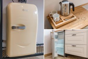 a refrigerator sitting next to a counter with cups at Pokoje LotNik nad jeziorem in Nikutowo +7 photos