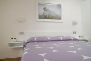 Postel nebo postele na pokoji v ubytování B&B Residenza Aragonese