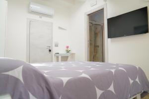 TV a/nebo společenská místnost v ubytování B&B Residenza Aragonese