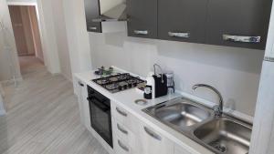 Kuchyň nebo kuchyňský kout v ubytování Casa Ponente