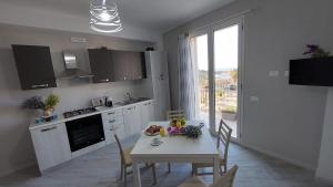 Kuchyň nebo kuchyňský kout v ubytování Casa Ponente