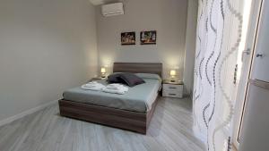 Postel nebo postele na pokoji v ubytování Casa Ponente