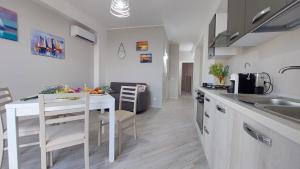 Kuchyň nebo kuchyňský kout v ubytování Casa Ponente