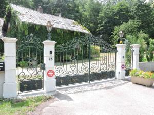 Un jardín fuera de Gîte de l'Ancienne Scierie