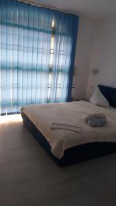 Postel nebo postele na pokoji v ubytování Sofial Guesthouse