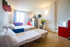 Кровать или кровати в номере Residence Mediterraneo