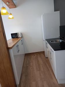 Kuchyňa alebo kuchynka v ubytovaní Albergue Hostel Nuestra Señora del Camino