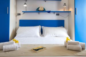 Кровать или кровати в номере Residence Mediterraneo
