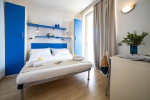 Кровать или кровати в номере Residence Mediterraneo