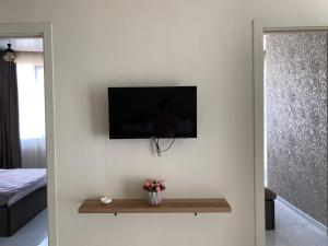 TV a/nebo společenská místnost v ubytování Horizons Hotel Rooms