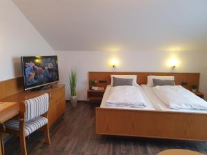 Postel nebo postele na pokoji v ubytování Kurhotel Anders