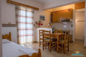 Kuchyňa alebo kuchynka v ubytovaní Hotel Arion + 7 fotografií