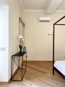 Posteľ alebo postele v izbe v ubytovaní Corallini Luxury Apartments - Bokè Apartment