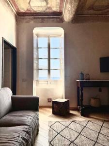 Televízia a/alebo spoločenská miestnosť v ubytovaní Corallini Luxury Apartments - Bokè Apartment