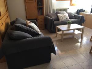 Posezení v ubytování Atico en Biescas con Piscina, Tenis y Barbacoa