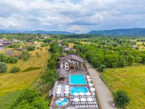 an aerial view of a estate with a swimming pool at Sofion hotel&resort in Solotvyno