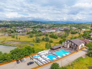 an aerial view of a resort with a swimming pool at Sofion hotel&resort in Solotvyno