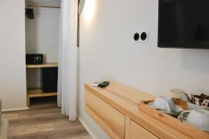 TV a/nebo společenská místnost v ubytování Princess Mare Hotel - Adults Only