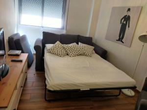 Postel nebo postele na pokoji v ubytování Piso restaurado en Santa Cruz de La Palma