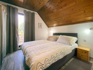 מיטה או מיטות בחדר ב-Apartment Ivanka