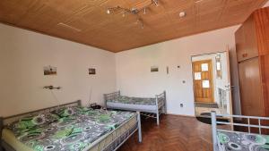 Postel nebo postele na pokoji v ubytování Apartmán Modré z nebe