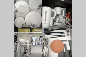 a kitchen pantry filled with white plates and utensils at Estudio Monoambiente in Cochabamba