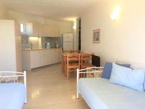 A kitchen or kitchenette at Galini Studios and Apartments