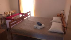 Postel nebo postele na pokoji v ubytování Relax in Črni Kal 2