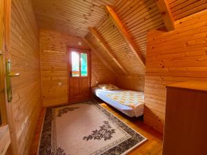 Postel nebo postele na pokoji v ubytování Kamp Kaludra