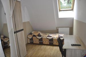 Łóżko lub łóżka w pokoju w obiekcie Pokoje na wynajem Gdańsk