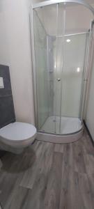 Kúpeľňa v ubytovaní Koller Apartmanház