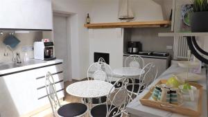 Kuchyň nebo kuchyňský kout v ubytování B&B Residenza Aragonese